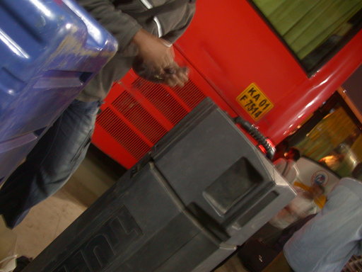 Guy carring weapons at Kempegowda